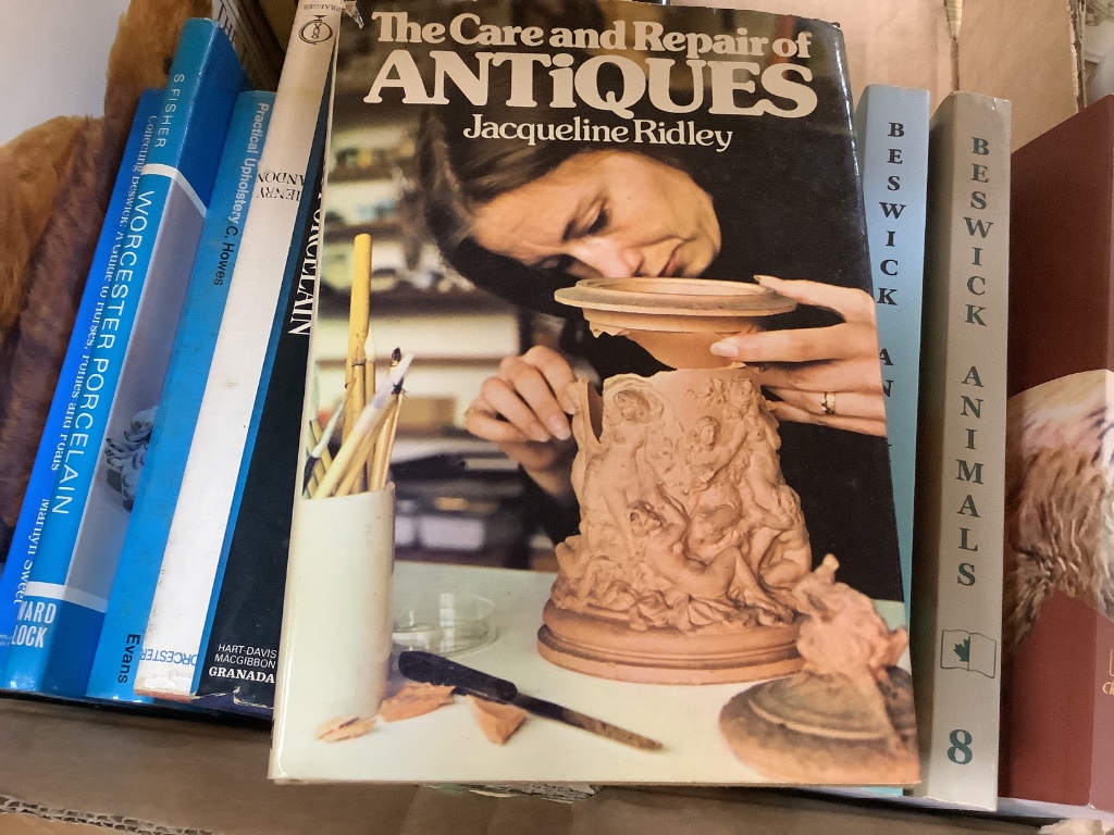 A quantity of mixed reference books to include The Care and Repair of Antiques, The Beswick Price Guide, The Encyclopedia of Antiques, Worcester Porcelain, Restoring Antiques etc.